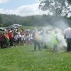 Elders walk through Smoking Ceremony